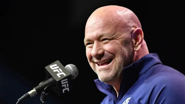 UFC CEO Dana White has a laugh with reporters during a press conference.
